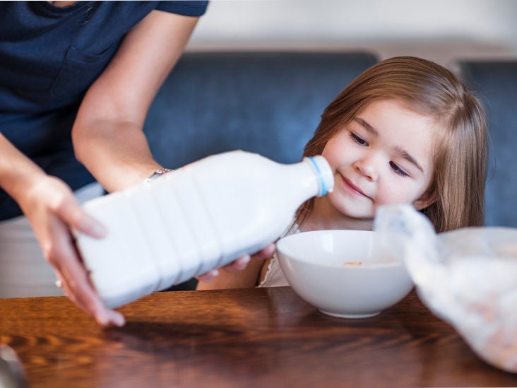 adding cereal to breast milk for reflux