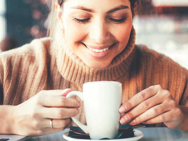 person drinking coffee