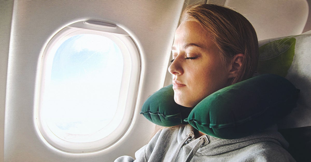 How to Sleep on a Plane: Where to Sit, What to Pack, and Sleep Tips