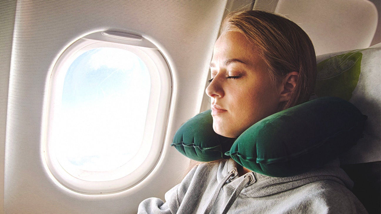 https://post.greatist.com/wp-content/uploads/sites/2/2015/08/woman-airplane-sleeping-1296x728-header-1296x728.jpg