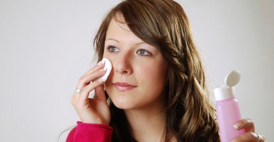 Woman Using Apple Cider Vinegar on Her Face