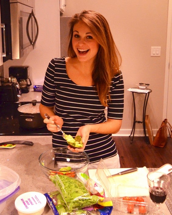 The author, Locke, cooking in her kitchen.