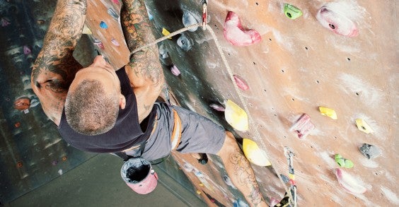 Man Rock Climbing