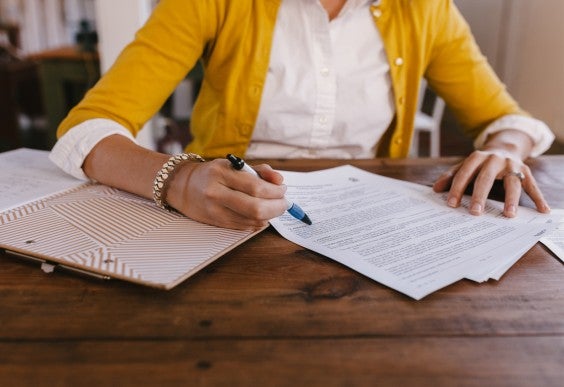 Woman Doing Paperwork