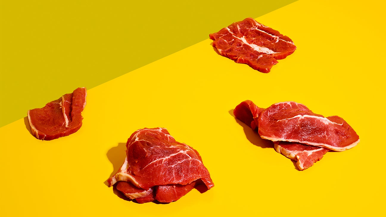 Steak on yellow background