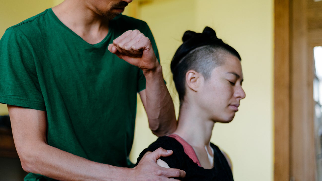 woman receiving a trigger point massage header