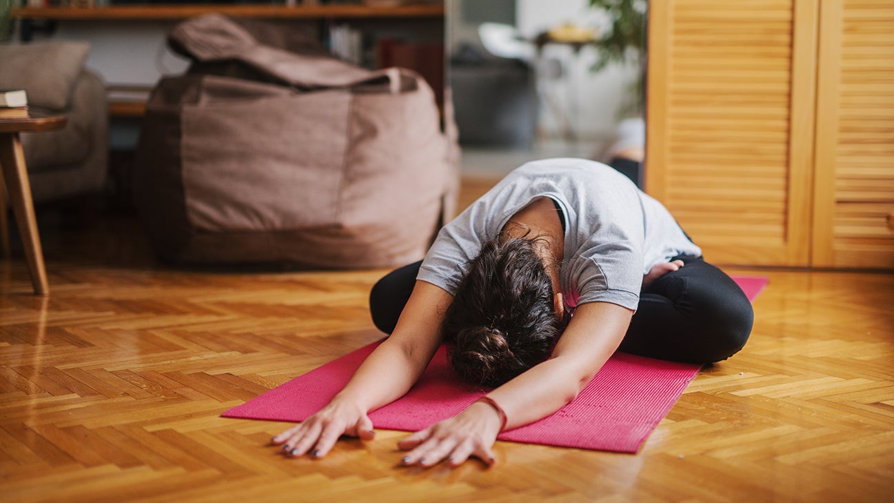 person doing yoga for skin glow header