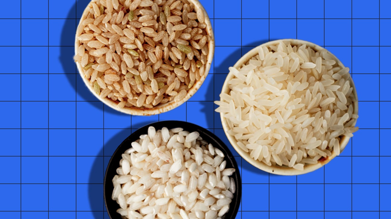 Three bowls of rice on blue grid background 