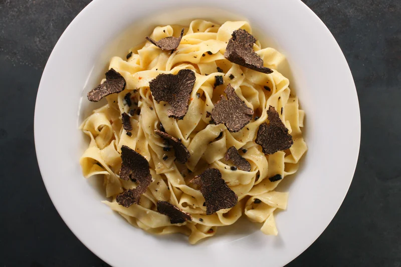 Black Truffles Over Fresh Pasta
