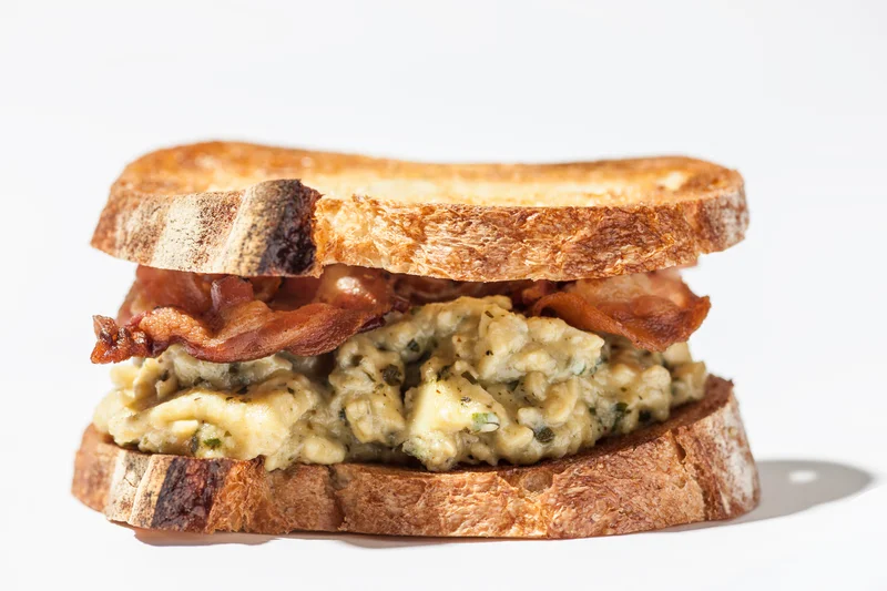 Breakfast Sandwich with PestoScrambled Eggs and Crispy Pancetta