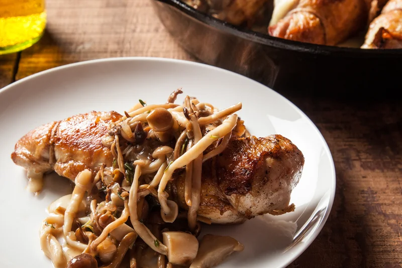 Prosciutto and FontinaStuffed Chicken Breasts with Mushroom Sauce