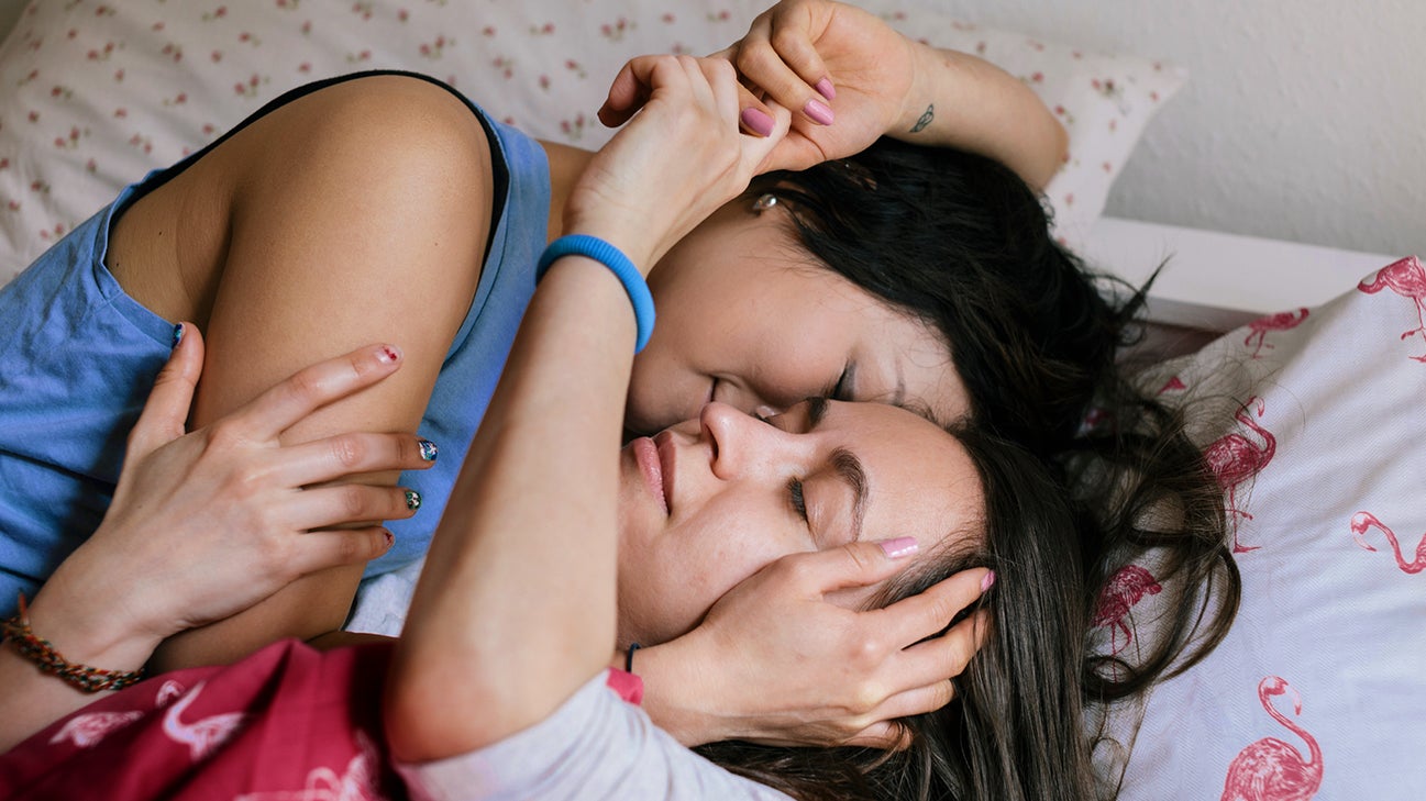 couple cuddling in bed