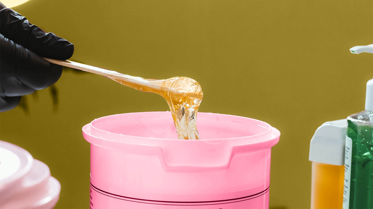 a toothpick with wax on it