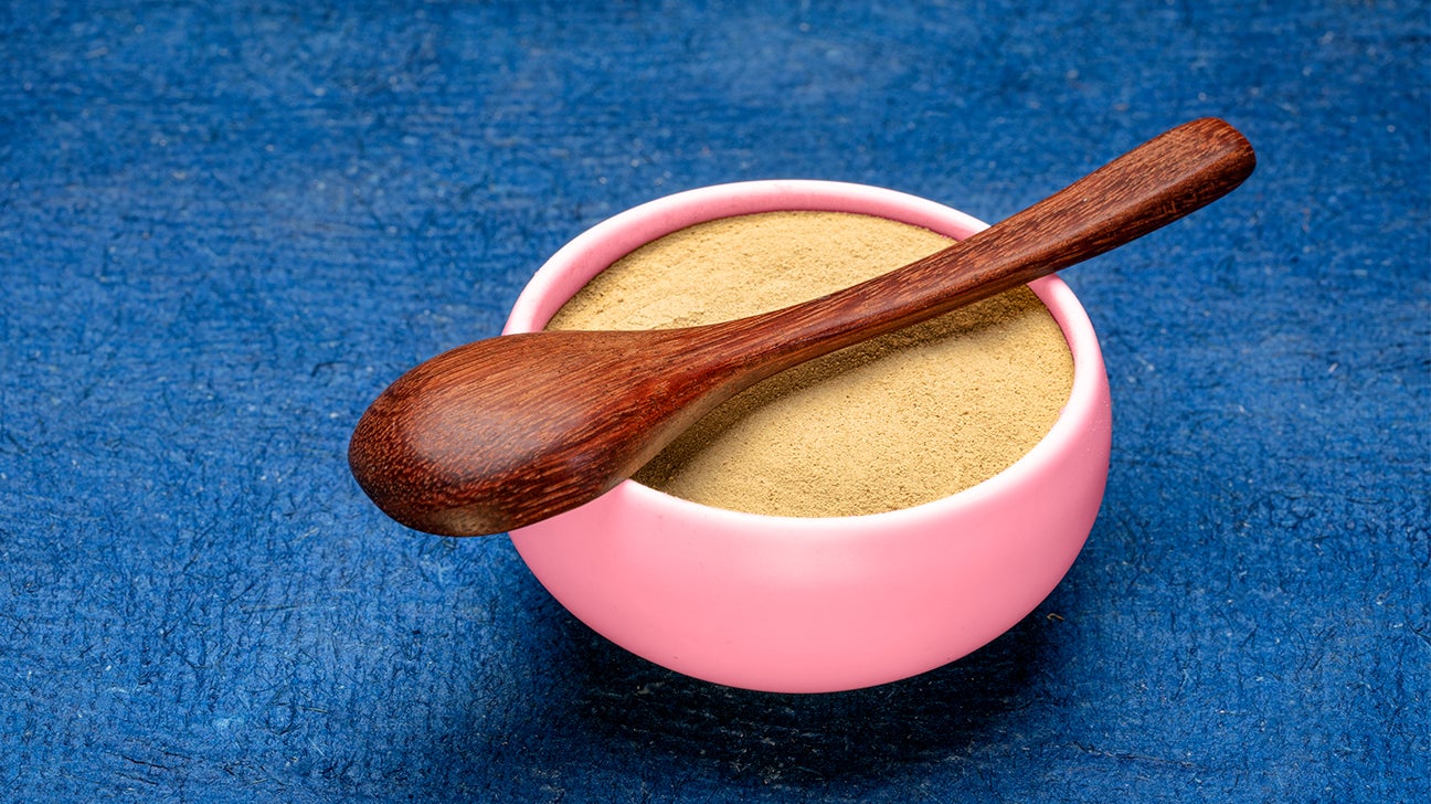 pink bowl of ashwagandha powder