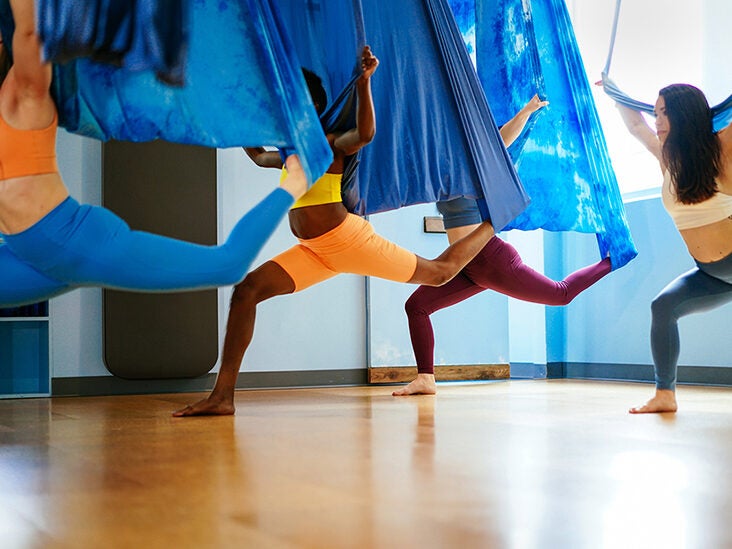 We're Soarin', Flyin': Everything You Need to Know About Aerial Yoga