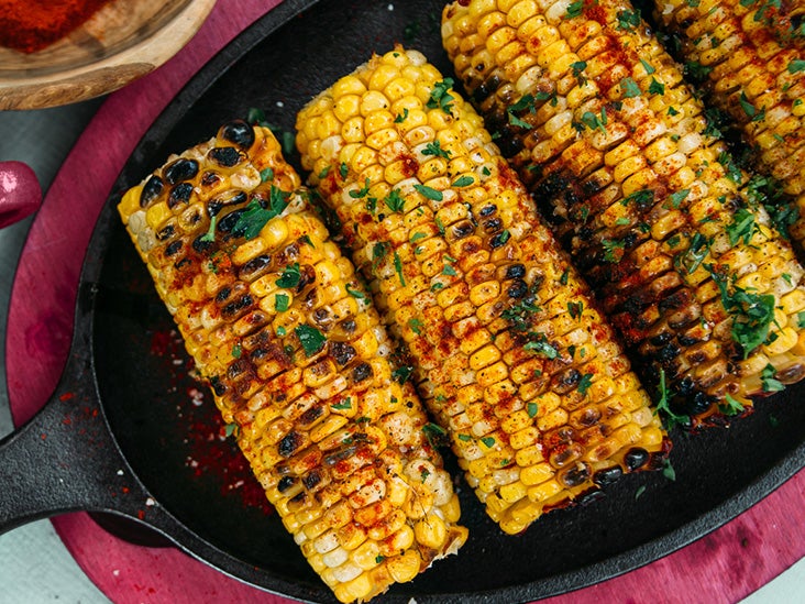 Grilled corn on the cob in skillet