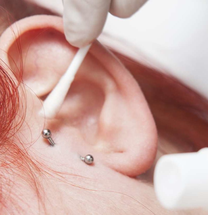 Infected tragus piercing: Symptoms, treatment, and home ...
